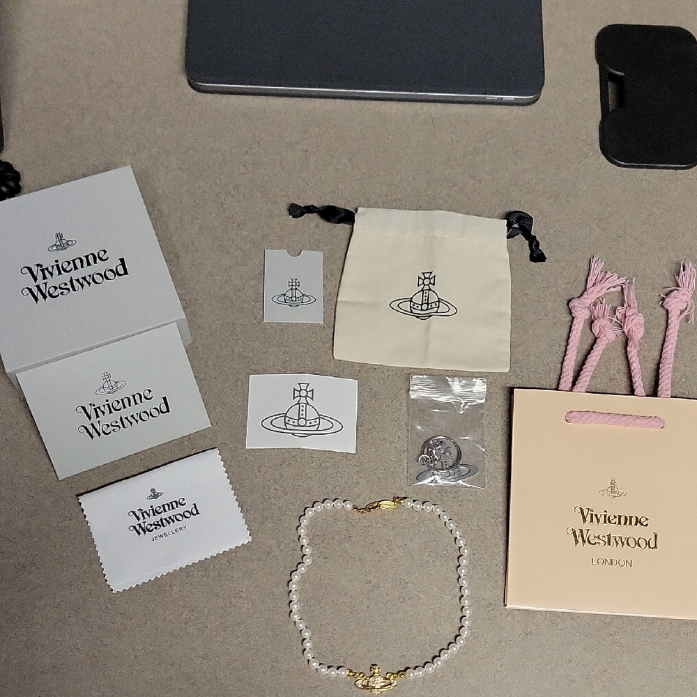 Vivienne Westwood Pearl Necklace with Gold Accent